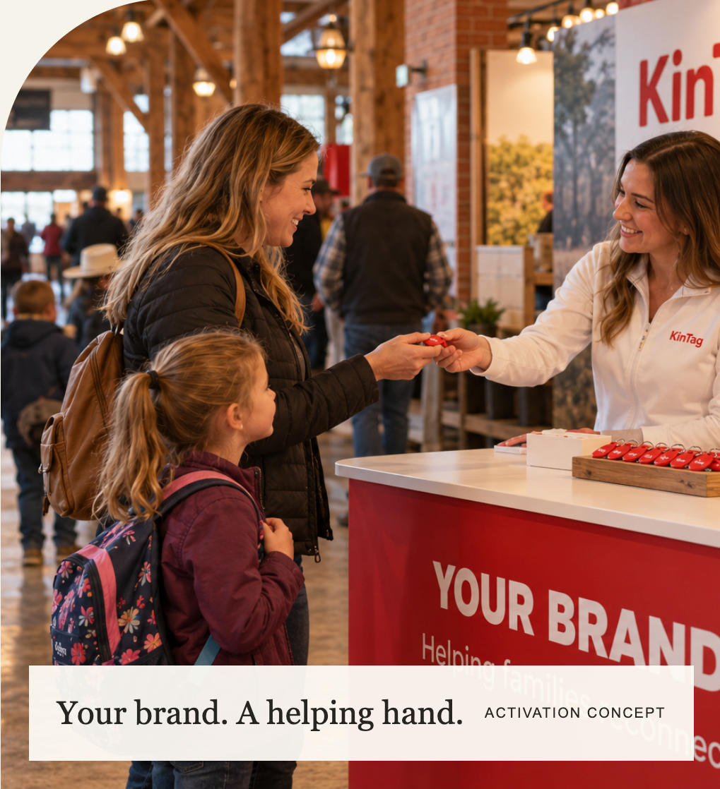 Activation concept: a family receiving a KinTag at a sponsor-branded welcome counter